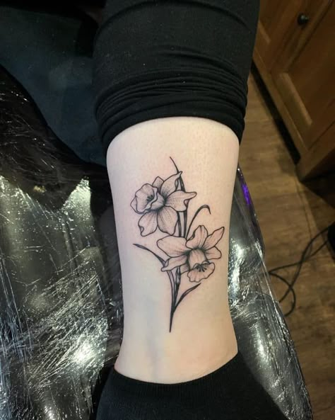 Daffodil Tattoo On Hand, Orchid And Daffodil Tattoo, Daffodil Tattoo Shaded, Masculine Daffodil Tattoo, Daffodil Tattoo Leg, Daffodil With Butterfly Tattoo, Daphodil Tattoos, Daffodil Tattoos For Women, Two Daffodils Tattoo