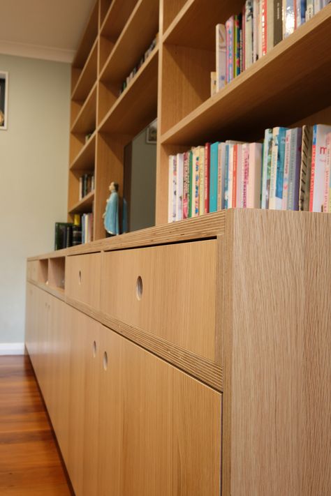 Detail of bespoke entertainment unit in oak with 18mm/13ply birch substrate for a family home in Island Bay. Many of the edges have been doubled, creating a 36mm edge in many places. How's that for furniture with an edge!  #bookcase #tvunit #plywood #furniture Plywood Built In Shelves, Plywood Built In, Birch Bookcase, Plywood Bookcase, Small Bedroom Office, Built In Tv Wall Unit, Built In Cabinet, Entertainment Wall, Tv Wall Unit