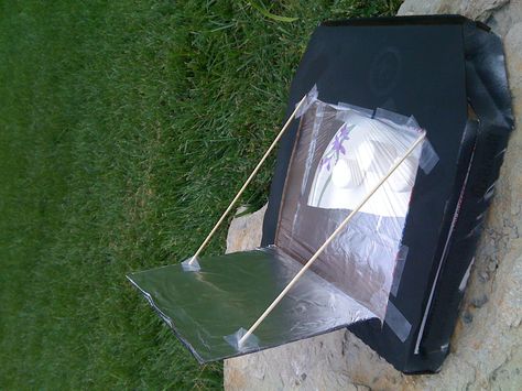 Solar oven from a pizza box... well, it kept the kid busy for a while.  Marshmallows dried out instead of getting gooey. Solar Oven, Science Notebook, Pizza Boxes, Pizza Box, A Pizza, The Kid, Business For Kids, Marshmallows, Pallet Coffee Table