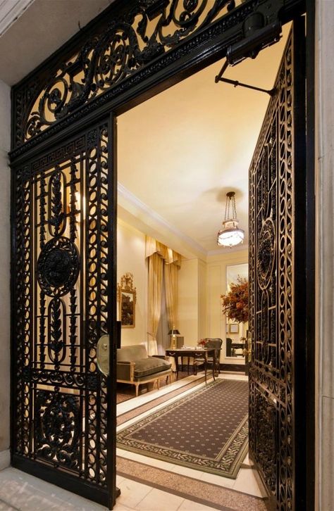 Joan Rivers New York apartment. The cast iron gates add some privacy. Upper East Side Penthouse, Pintu Ganda, Cast Iron Gates, Nyc Decor, Upper East Side Apartment, Manhattan Art, New York Penthouse, Art Eclectic, Iron Door