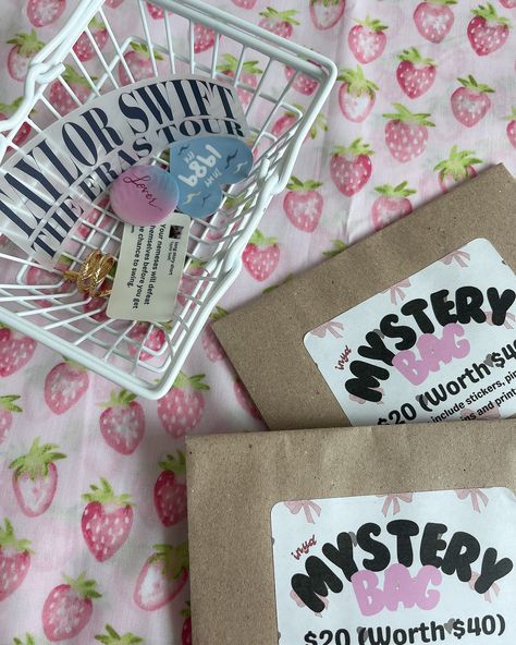 a shrouded mystery❓🎀 THIS NEW IN: mystery bags will be up for grabs at our upcoming NAO pop-up! they consist of up to $40 worth of stickers, pins, keychains, prints and more 💘 we’ll also be including some discontinued items as well as unreleased stickers, just for half the price 🤩 swing by if you’re around the area! ☁️ what else would you like to see inside? #taylorswift #taylorsversion #taylornation #thetorturedpoetsdepartment #ttpd #mysterybag #theerastour #tstheerastour Mystery Bags, Market Displays, Mystery Bag, Laundry Detergent, Popular Culture, Instagram A, Keychains, 1st Birthday, Pop Up