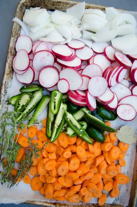 This recipe for Mexican pickled jalapeños and radishes is tangy, spicy, and just the right amount of crunchy. The radishes add a nice pink hue Pickle Jalapenos, Mexican Pickled Vegetables, Pickled Vegetables Recipe, Radish Recipes, Vegan Mexican Recipes, Pickled Carrots, Pickled Radishes, Fermentation Recipes, Meatless Main Dishes