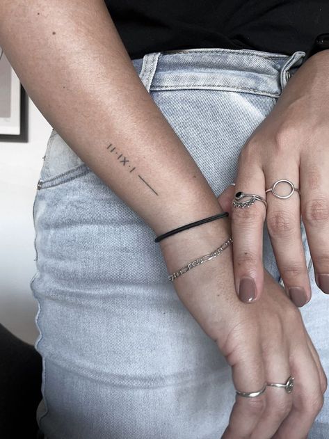 White Roman Numeral Tattoo, 2013 In Roman Numerals Tattoo, Roman Numeral Tiny Tattoo, Date Tattoos For Women Roman Numerals, Roman Numeral Tattoo Location, Minimal Roman Numeral Tattoo, Tattoo Ideas Numbers Roman Numerals, 1992 Roman Numeral Tattoo, Dainty Roman Numeral Tattoo Wrist