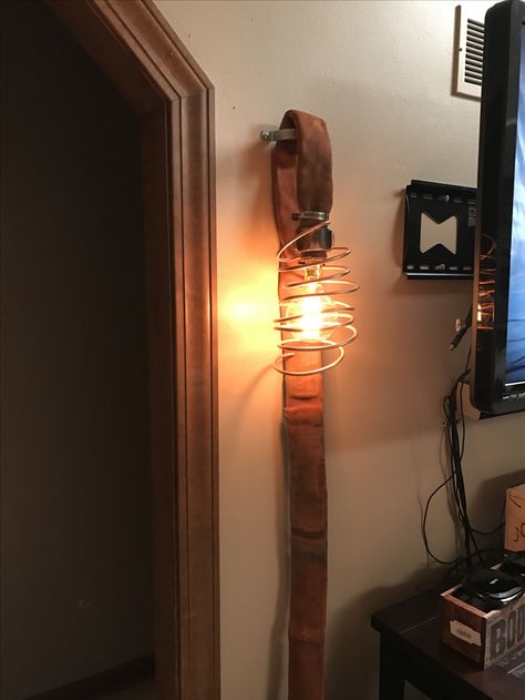 Firefighter Bathroom Ideas, Fire Hose Decor, Fire Hose Projects, Waterside House, Fire Hose Crafts, Firefighter Man Cave, Fire Decor, Firefighter Decor, Fire Helmet