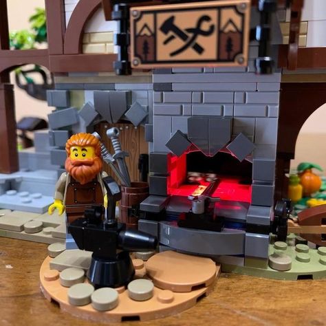 Construct a magnificent Medieval Blacksmith with LEGO® Ideas Medieval Blacksmith (21325). This 3-level building showcases a furnished bedroom, kitchen, and workshop. Illuminate the forge with a LEGO light brick. Includes 4 minifigures, horse, and cart. A stylish gift for history enthusiasts. #LEGO #Blacksmith #ad Lego Blacksmith, Medieval Blacksmith, Medieval Lego, Lego Dnd, Lego Medieval, Lego Knights, Black Smith, Blacksmith Forge, Light Brick