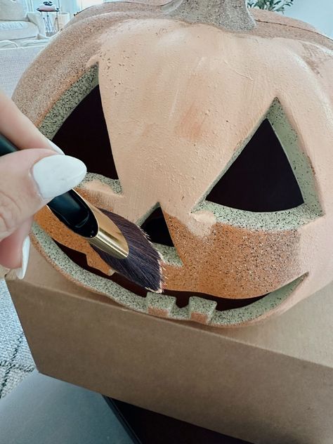 painting the DIY terracotta pumpkin Terracotta Halloween, Spray Paint Ceramic, Terracotta Pumpkins, Pumpkin Spray Paint, Textured Spray Paint, Terracotta Paint, Sugar Skull Halloween, Leftover Paint, Halloween Porch Decorations