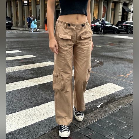 Low-Rise, Cargo Pants With Front And Back Pockets, Two Pockets On The Side Leg, An Adjustable Drawstring Waist And A Straight Leg Fit. Fabrics: 100% Cotton Measurements: 9" (23 Cm) Rise, 28" (71 Cm) Inseam, 27" (69 Cm) Waist. Made In: China These Are The Cutest Kaki Cargo Pants! They Are Brand New With The Tags Still Attached! They Are Marked As Os But Fit Like A 24-28 Due To The Adjustable Elastic Waistband! Mid-rise Brown Pants For Streetwear, Mid-rise Brown Bottoms With Cargo Pockets, Brown Mid-rise Bottoms With Cargo Pockets, Mid-rise Brown Pants With Hip Pockets, Brown Mid-rise Pants With Hip Pockets, Brown Wide Leg Cargo Bottoms, Brown Full Length Cargo Pants, Brown Mid-rise Utility Cargo Pants, Brown Utility Style Mid-rise Cargo Pants