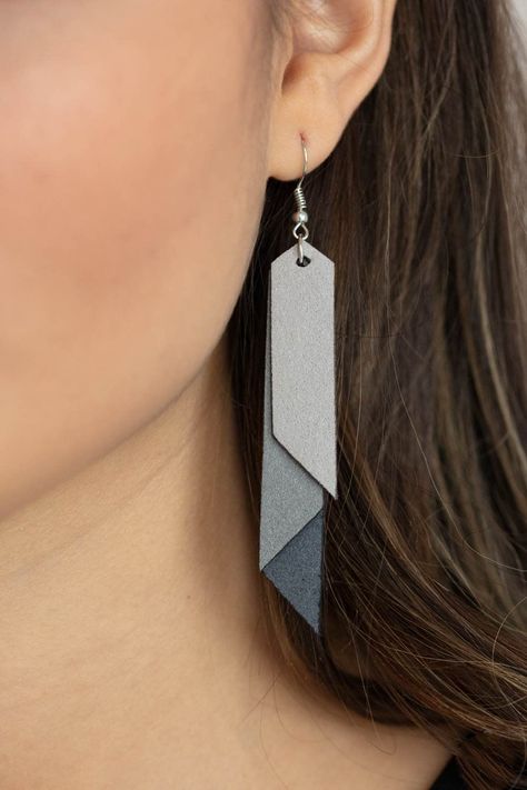 Suede Shade Silver Earrings- Jewelry By Bretta Featuring angled edges, an ombre of gray suede leather frames layer into a tapered tassel for an earthy effect. Earring attaches to a standard fishhook fitting. Sold as one pair of earrings. Ordered 3/1/2021 Layered Leather Earrings, Leather Earrings Ideas, Handmade Leather Jewelry, Diy Leather Earrings, Leather Jewelry Diy, Leather Jewellery, Leather Frames, Paparazzi Accessories, Leather Projects