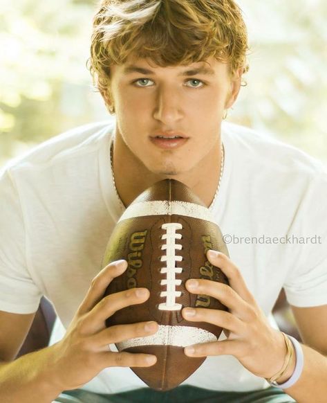 Senior Football Photography, Football Senior Photos, Football Senior Pictures, Senior Pictures Boys Outdoors, Senior Year Pictures, Wisconsin Football, Senior Photos Boys, Football Poses, Unique Senior Pictures