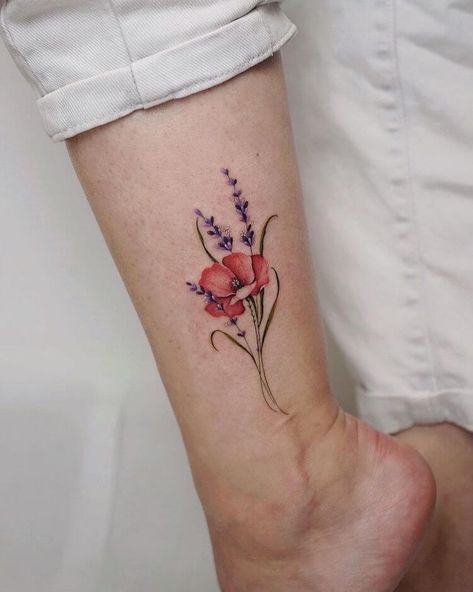 17 Remarkable Poppy Flower Tattoo Designs - Mom's Got the Stuff Poppy Flower Moon Tattoo, Field Of Poppies Tattoo, Tattoos With Names And Flowers, Poppy Wrist Tattoos For Women, Wildflower Poppy Tattoo, Larkspur And Poppy Flower Tattoo, Small Poppy Tattoos, Poppy Arm Tattoos For Women, Dragonfly And Poppy Tattoo