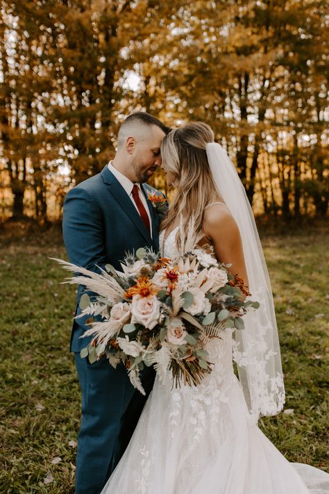 #rust #fallweddingideas #fallweddingcolors #wedding #navy Rust And Navy Bridal Bouquet, Blue And Rust Wedding Bouquet, Navy Blue Groomsmen Suits Fall Wedding, Rust Pink And Navy Wedding, Navy Blue Tux Fall Wedding, Navy Suit With Rust Tie, Navy Blue And Rust Wedding Bouquet, Navy Rust Sage Wedding, Rust And Navy Wedding Invitations