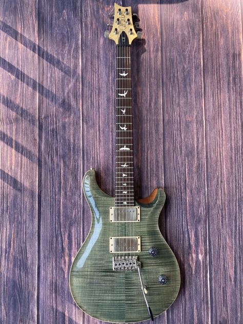 PRS CE 24 Bolt-on Electric Guitar - Trampas Green · $1,669.00 Green Guitar, Neon Green Guitar, Green Electric Guitar, Light Green Electric Guitar, Dark Green Electric Guitar, Green Fender Guitar, Green Telecaster Guitar, Green Electric, Prs Guitar