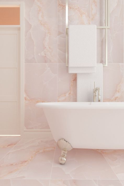 We love these subtle Venturi Onyx Pink porcelain tiles from @reedharristiles, you couldn't help but relax in a bathroom like this! This product features an onyx effect that gives your walls and floors a look of luxury, whilst also being easy to keep clean and is maintenance-free - perfect for busy areas. #londoninteriors #tilestyle #onyxeffect #luxurybathroom #interiorstyling #interiordesign #reedharristiles #pink #stylishbathroom #onyxslab #interiors4all #tastemakers Onyx Tile Bathroom, Modern Pink Bathroom, Pink Tile Bathroom, Washroom Tiles, Pink Bathroom Tiles, Barbie Bathroom, Quartz Bathroom, Marble Bathroom Floor, Onyx Tile