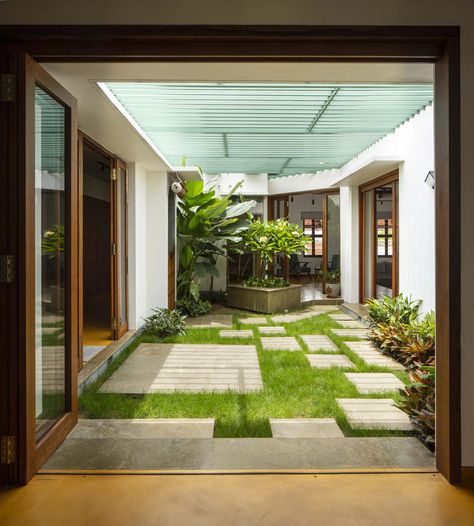 A central courtyard is at the heart of this Vastu-compliant family home in Coimbatore | Architectural Digest India Architecture Digest, Indoor Courtyard, Central Courtyard, Window Reveal, Rammed Earth Wall, Temple Design For Home, Courtyard Design, Internal Courtyard, Small Courtyards