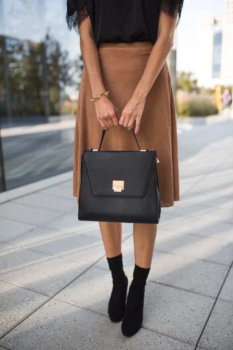 The Miller Affect carrying a black structured handbag from The Styled Collection Black Structured Bag, Structured Black Bag For Shopping, Black Structured Bag For Shopping, Chic Black Structured Bag, High-end Black Bags For Workwear, Luxury Black Structured Satchel, Structured Tote Bag, Bag Shapes, Structured Purse