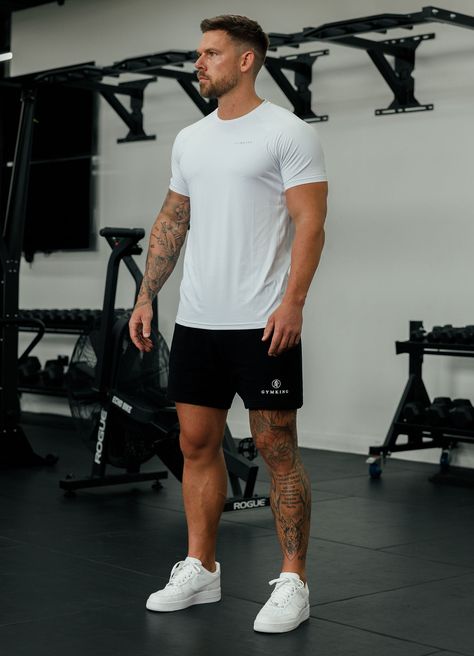 Please note: This product is muscle fit, size up for a relaxed fit. Product Details Men's Training T-Shirt Gym wear Muscle fit Linear Gym King logo to chest Reflective tab to back neck Matte finished textured fabric Performance Properties Breathable Lightweight Sweat wickable Size and Fit Model is wearing: Size Medium Model's height: 5'11" Care and Material Machine wash at 30°C 89% Polyester, 11% Elastane Style Code: SST-BNVRT Gym Looks Outfits Men, Gym Fits For Men, Fit Man Aesthetic, Men Gym Outfits Aesthetic, Men’s Gym Wear Outfits, Man Sport Outfit, Men Sport Outfit Gym, Gym Look Men, Fitness Aesthetic Men