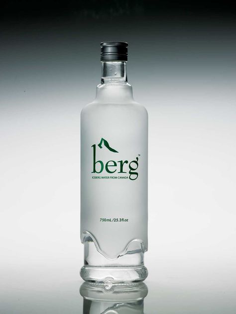 Iceberg water is a unique soft water with a super low mineral content. This water's journey started over 15,000 years ago in the ancient glaciers of western Greenland.  The bottle has been designed to look like glass but with all the conveniences of PET. It represents the ice cap, and the green tint reflects the ice cold green shade often observed in icebergs. Brandy Bottle, Cute Office Supplies, Water Packaging, Bottle Design Packaging, Fabric Freshener, Tasting Menu, Water Bottle Design, Beverage Packaging, Glass Water Bottle