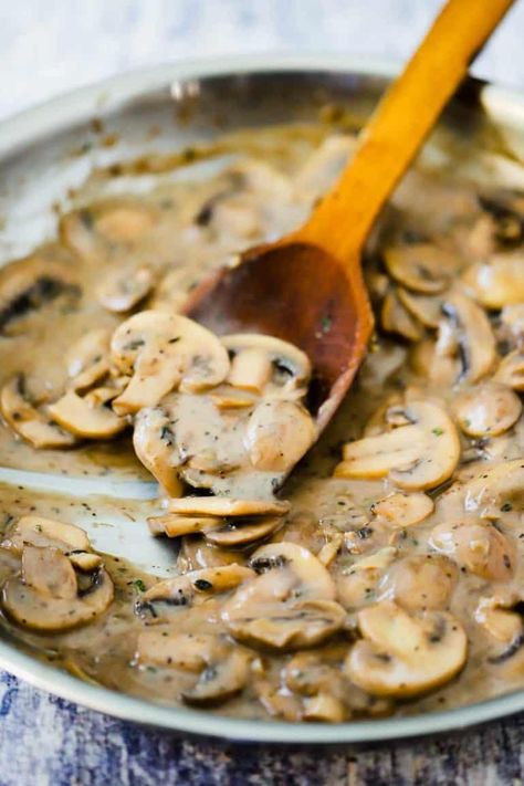 A large skillet filled with a mushroom sauce with a wooden spoon in it. Mushroom Sauce For Burgers, Swiss Burger, Mushroom Burger Recipe, Mushroom Swiss Burger, Burger Sauces Recipe, Mushroom Burger, Burger Sauce, Fast Easy Meals, Mushroom Sauce