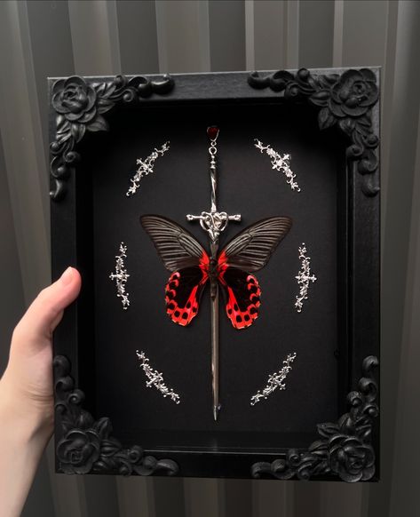 Since the first one I made of these became so popular, I decided to make two more, which are now available on my site! Grab them while you can 😊🖤❤️ . . . #smallbusiness #art #artist #handmade #butterfly #insect #butterflies #insects #entomology #goth #gothic #gothicart #taxidermy #oddity #oddities #curio #curios #curiosities #odditiesandcuriosities #shadowbox #red #black #sword #aesthetic #gothaesthetic #crowcore Insect Taxidermy Art, Bug Pinning Display, Faux Taxidermy Diy, Butterfly Taxidermy Art, Oddities Art, Moth Taxidermy, Entomology Decor, Goth Castle, Bug Taxidermy