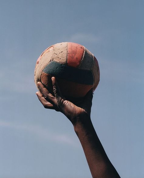 Simon Heger Knuden photographically explores football’s circumferential culture in Mozambique. School Spirit Shirts Designs, Ball Photography, Volleyball Wallpaper, School Spirit Shirts, Volleyball Pictures, Maputo, Sports Aesthetic, Kageyama Tobio, Beach Volleyball