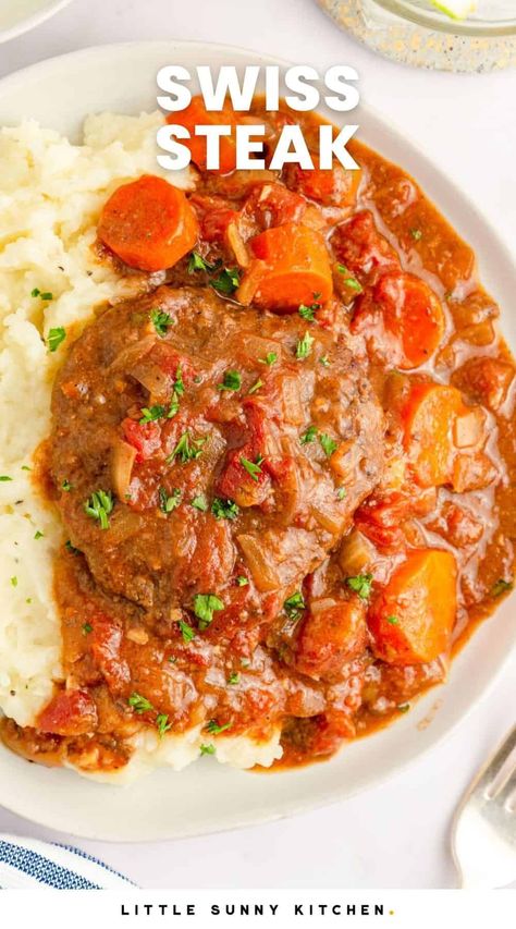 Warm and hearty, this tender slow-cooked swiss steak in rich tomato and beef gravy is a simple and delicious one-pot meal. Tender Minute Steak Recipes, Quick Round Steak Recipes Easy, Easy Swiss Steak Recipes Crock Pots, Fast Easy Supper, Swiss Steak Made With Ketchup, Swiss Steak Recipes With Stewed Tomatoes, So Tender Swiss Steak, Minute Steak Recipes, Tomato Juice Recipes