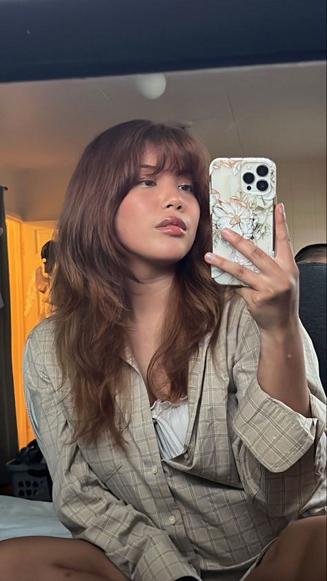 Girl posing in front of mirror. She is showing her Light brown hair color with her D.I.Y. haircut of layers and bangs Wolfcut Face Framing, Butterfly Haircut With Full Bangs, Light Brown Wolfcut, Summer Light Brown Hair, Butterfly Haircut Bangs, Light Brown Hair With Layers, Butterfly Haircut Wavy Hair, Artsy Haircut, Butterfly Cut With Bangs