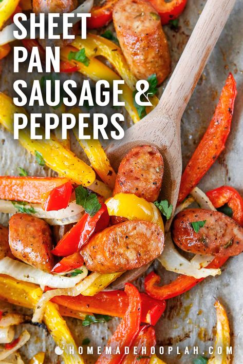 Sheet Pan Sausage and Peppers! A simple 30 minute meal, this baked sheet pan sausage and pepper dinner has a mix of bell peppers, onions, Italian seasoning, and your flavor choice of sausage. | HomemadeHooplah.com Sausage Pepper Sheet Pan, Sheet Pan Italian Sausage And Peppers, Sheet Pan Sausage And Peppers, Bake Sausage In Oven, Sheet Pan Sausage, Pan Sausage, Sausage Peppers And Onions, Smoked Sausage Recipes, Dinners Recipes