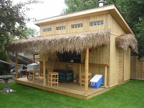 tiki bar in my back yard in saskatoon Shed Clubhouse, Pool Hut, Shed Pub, Tiki Bars Backyard, Bamboo Hut, Party Shed, Outdoor Tv Cabinet, Saskatoon Saskatchewan, Waterfront House