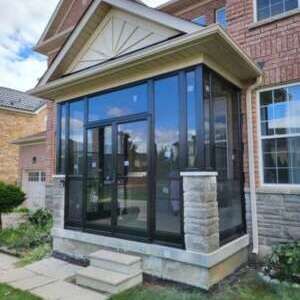 Front porch enclosure Wide Porch, Porch Enclosure, Porch Enclosures, Small Front Porch, Porch Area, Pet Door, Small Front Porches, Aluminum Roof, Window Replacement