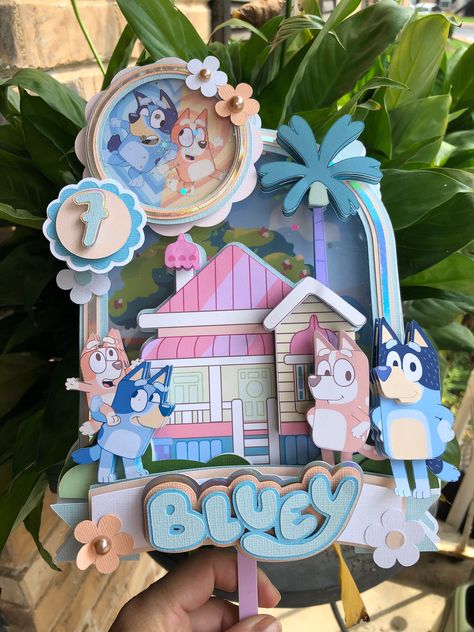 All products are made with High Quality Cardstock This beautiful Bluey-inspired cake topper is perfect for decorating your party and adding a special and personalized touch. The designs are layered for a 3D effect, they come with an acrylic stick that you use to place on top of your cake. Cake topper contains shaker, and lights and measures approximately 7" wide and 9" tall. Layered Cake Topper, Diy Bluey Party Decorations, Shaker Cake Topper, Bluey Cake Topper, 3d Cake Toppers, Personalized Party Decor, New Business Ideas, Diy Cricut, Cake Topper