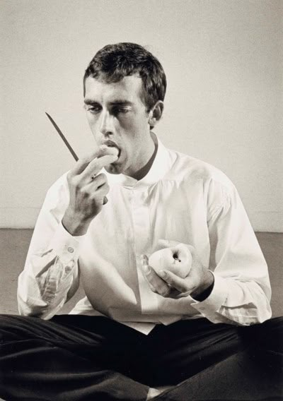 PETER HUJAR (1934–1987) | 'Forbidden Fruit' (David Wojnarowicz Eating an Apple in an Issey Miyake shirt) from, The Twelve Perfect Christmas Gifts from Dianne B., 1983 | 1980s, Photographs | Christie's Person Eating Photography, Person Eating Apple, Person Eating Reference, David Wojnarowicz, Peter Hujar, Personal Investigation, Sharp Knife, Forbidden Fruit, Downtown New York