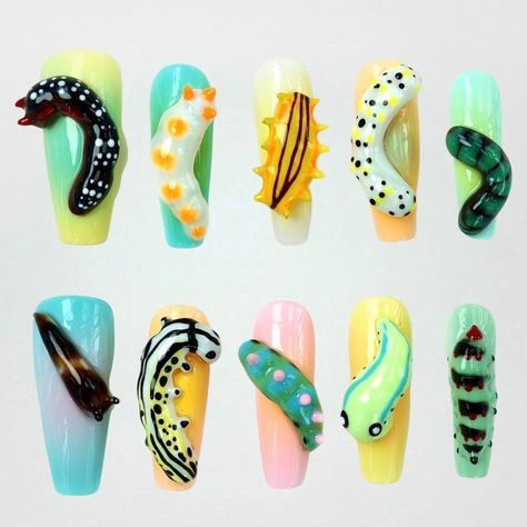 Each adorable grub in our colorful nail design is carefully and manually molded by hand. 🐛💅 Bursting with vibrant hues, these playful nails are perfect for adding a touch of fun to your look. Let your personality shine through with every unique detail. -- My hands are exhausted from sculpting all these tiny pieces, but wow, it’s totally worth it. The grubs?! 🐛 Are you kidding me?! So CUTE!!! -- #donailsart #cutenails #pressonnails #nails #cutegrubnails Colorful Nail Designs, Press On Nails, Beautiful Nails, Cute Nails, Nail Designs, Nail Art, Nails, 10 Things, Color