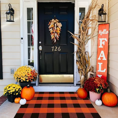 PRICES MAY VARY. 👍High Quality:Hand-woven buffalo plaid rug is made of fabric cotton, the thick cotton material is elegant and luxurious, durable and comfortable, a great outdoor rug. 🌈Seasonal Classic Design:Cute Outdoor Doormats to Welcome Fall,Refresh your front door with outdoor mats perfect for ushering in cooler temps and cozier vibes. ❤️Size And Care Instruction:The size of our fall door mat (27.5 x 43 Inches) fits any space. It perfect combination with the welcome door mat form a layer Porche Halloween, Front Porch Rug, Porch Fall Decor, Check Rug, Halloween Front Doors, Halloween Front Porch Decor, Rug Cotton, Porch Rug, Halloween Door Mat