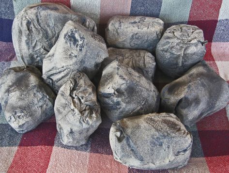 Rocks made from stuffed brown paper lunch bags, glued shut, spray painted with several stone colors, and textured stone spray paint here and there too...good for many kinds of biblical lessons along the journey. Cave Quest Vbs 2016, Cave Quest Vbs, Stone Spray Paint, Cave Quest, Brown Paper Lunch Bags, Fake Rock, Paper Lunch Bags, Vbs Themes, Paper Lunch