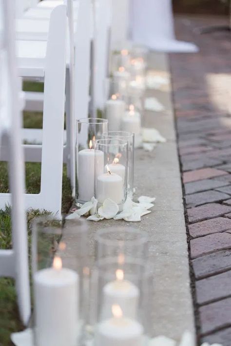 Candles Wedding Ceremony Aisle, Ceremony Aisle With Candles, Candles Ceremony Aisle, Ceremony Candles Wedding, White Candles Wedding Table, Candles Along Wedding Aisle, Wedding Ceremony Simple Decorations, Wedding Aisle Decorations Indoor Simple, Flower Columns Wedding Ceremony