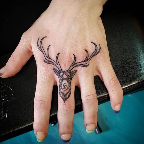 12+ Best Deer Finger Tattoo Designs | PetPress Reindeer Tattoo, Deer Head Tattoo, Cool Finger Tattoos, Tattoo Spots, Saved Tattoo, Pretty Hand Tattoos, Bull Tattoos, Finger Tattoo Designs, Dot Tattoos