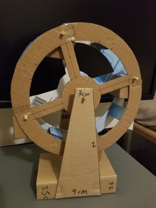 Cardboard Ferris Wheel - Learning From Home Project : 21 Steps (with Pictures) - Instructables Cardboard Ferris Wheel, Ferris Wheel Model, Ferris Wheel Art, Marble Maze, Rectangular Prism, Paper Bag Design, Wheel Craft, Popsicle Crafts, Art And Craft Ideas