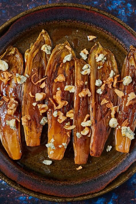 This caramelised chicory recipe sees the bitter leaves charred in a pan before being braised in star anise-infused orange juice and stock until tender. The walnuts and shallots on top add crunch, while the crumbled Stilton lends a salty, creamy finish. Chicory Root Benefits, Healthy Drink Recipes Smoothies, Almond Milk Smoothie Recipes, Blue Cheese Recipes, Chicory Recipe, Smoothie Recipes With Yogurt, Orange Star, Smoothie Recipes Strawberry, High Protein Smoothies