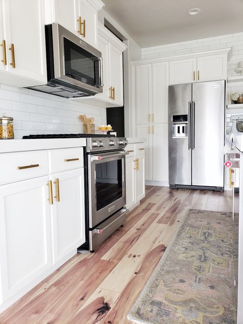 Long Subway Tile, Hickory Laminate Flooring, Hickory Floors, Kitchenaid Refrigerator, Hickory Flooring, Kitchen Aid Appliances, Master Kitchen, Beautiful Kitchen Designs, Quartzite Countertops