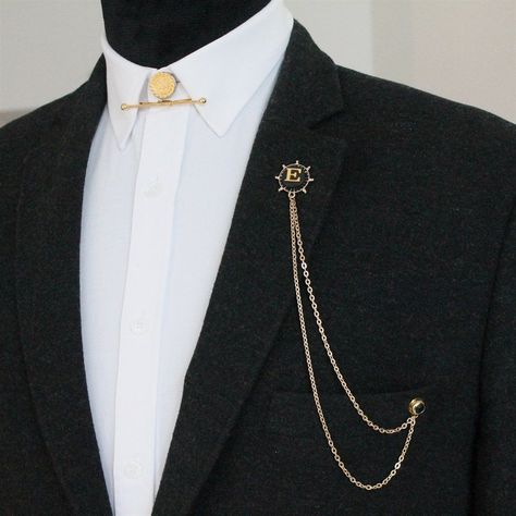 Unique design by Handmade. This is wonderful gift for your loved ones. It will show your jackets as chic and you will like to use with all your jackets and suits. Made by ✋🤚 with ❤️ at our studio. Color: Gold Letter Lapel Chain SHIPPING: Please select the shipping term which you prefer after you add the product to your shopping card. * STANDARD EXPRESS FREE SHIPPING to all over the world. The delivery time is 2-4 days as estimated. Mens Jewelry With Suit, Lapel Pins Mens Suit, Gold Suit Accessories, Suit Jewelry Men, Suit Accessories For Men, Lapel Chain, Chain Brooch, Chain Shipping, Brooch Men