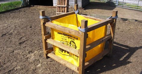 Horse Hay Feeder Made From A Few Bits Of Wood And A 1 Ton Sand Bag Used, discarded 1 ton sand bags are everywhere, on every building sit... Horse Feeder Diy, Diy Hay Feeder, Goat Hay Feeder, Hay Feeder For Horses, Horse Feeder, Horse Farm Ideas, Horse Hay, Diy Horse Barn, Horse Barn Ideas Stables