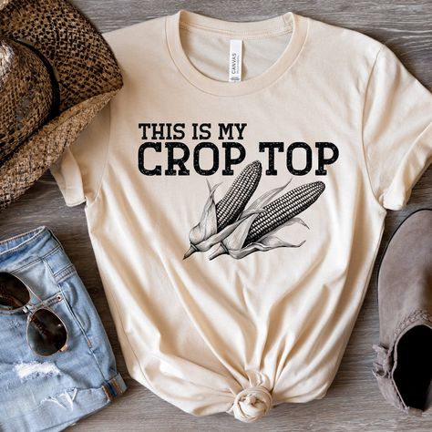 Farm Girl Crop Top Shirt - Farm Shirt - Corn Shirt - Homesteader Shirt - Farm Girl - Farm Girl Shirt - Farm Lover Shirt - Country Girl - FFA Adult T-Shirts: Bella and Canvas 3001C and 3001CVD.  100% airlume and ring spun cotton.  Heathers are 52% airlume combed and ring spun cotton 48% polyester. Side seamed, pre-shrunk.  Unisex sizing.  Tear away label.   Ladies Racerback Tanks: Bella and Canvas tanks.  100% airlume combed and ring spun cotton. Heather colors are 52% airlume combed and ring spu Farm Style Outfits Women, Ffa Shirts Designs, Cute Cricut Shirts Farm, Farm T Shirt, Farming Shirts For Women, Womans Farm Shirt, Farm Animal Shirts For Women, Girls Crop Tops, Ffa