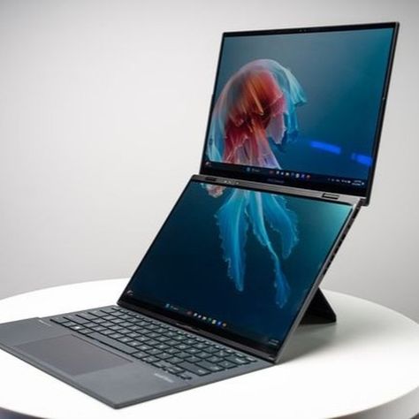 Experience innovation unleashed! 🔥 Asus transforms the Zenbook Duo with dual 14" 120Hz OLED displays and a detachable bluetooth keyboard. Debuting in the UK late January at £1,699. #Asus #ZenbookDuo #TechInnovation Asus Zenbook, Gaming Station, Tech Innovation, January 9, Bluetooth Keyboard, Home Office Setup, Office Setup, Gaming Computer, Dream Life