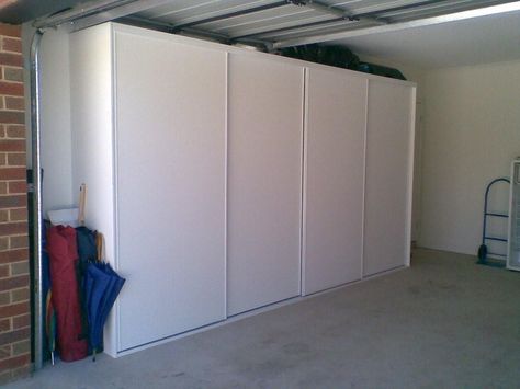 Garage Sliding Storage, Garage Closed Storage Ideas, Sliding Door Garage Storage, Garage Sliding Door Storage, Garage Storage Sliding Doors, Garage Sliding Shelves, Garage Cabinet Organization Ideas, Sliding Door Garage Cabinets, Garage Shelf With Sliding Doors