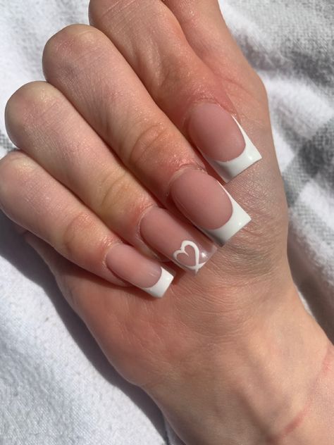 White Nails With Designs On Ring Finger, Nails With Letter And Heart, French Tip With Ring Finger Design, French Tip With Letter, White French With Heart, French Tips With Design On Ring Finger, French Tip Nails With Heart, French Tip Green, French Tip With Heart