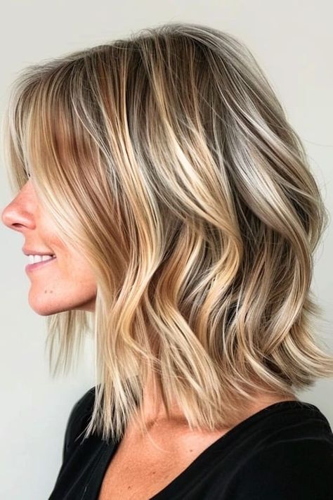 33 Chic Medium-Length Hairstyles for Women Over 50 - The Hairstyle Edit Short Beachy Waves Hair, Medium Length Hair With Waves, Blonde Highlights Over 50, Mid Length Fine Hair Styles For Women, Mid Length Hair With Highlights, Hair For Over 50 Women, Short Medium Blonde Hair, Medium Length Blonde Hair With Layers, Medium Length Shaggy Haircuts