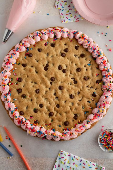 Get ready to celebrate any occasion with this soft and chewy chocolate chip cookie cake! Decorate it with a classic vanilla buttercream frosting or add your own favorite toppings to make it fun for your special day. Perfect for birthdays! Chocolate Chip Cookie Cake Recipe, Yummy Bars, Giant Chocolate Chip Cookie, 2024 Recipes, Chocolate Chip Cookie Cake, Vanilla Buttercream Frosting, Cookie Cake Recipe, Cookie Butter, Recipe Girl