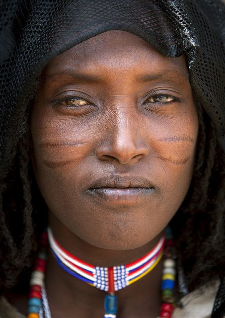 Karrayyu woman with scars during Gada ceremony - Ethiopia by Eric Lafforgue, via Flickr African Faces, Interesting Portraits, Oromo People, African Tattoo, Eric Lafforgue, Yellow Fruit, African People, Poster Layout, We Are The World