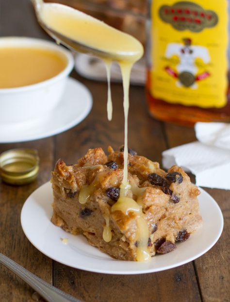 Bread Pudding with Hot Butter Rum Sauce -- nothing more comforting on a cool fall day as a nice big slice, well okay - chunk - of bread pudding. And, wow this sauce sounds amazing! Yummy!! Hot Butter Rum, Irish Bread Pudding, Butter Rum Sauce, Irish Bread, Rum Sauce, Butter Rum, Pinch Of Yum, Bread Pudding Recipe, Oatmeal Raisin Cookies