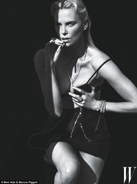 Sexy: Flashing plenty of flesh, the leggy South African smoulders in Cartier bling in a va... Alas Marcus Piggott, Mert And Marcus, Leather Jumpsuit, W Magazine, Sarah Jessica, Charlize Theron, White Photo, American Actress, Fashion Photo